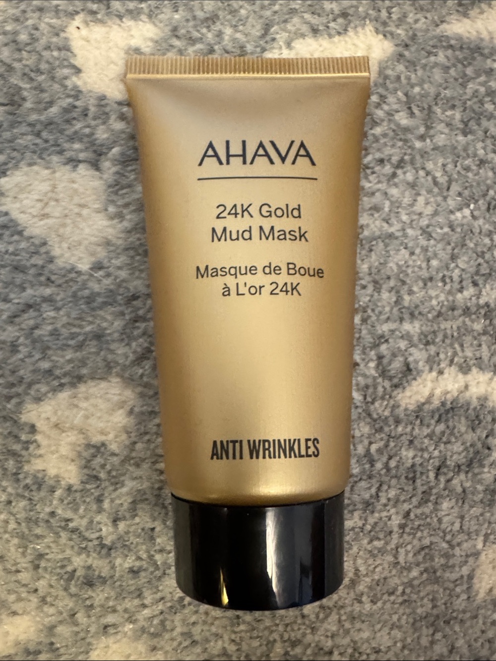 New AHAVA 24K Gold Mud Mask in Metallic Gold and Black